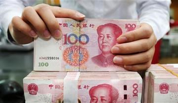 اليوان الصيني يسجل أدنى مستوى مقابل الدولار في 11 عاماً